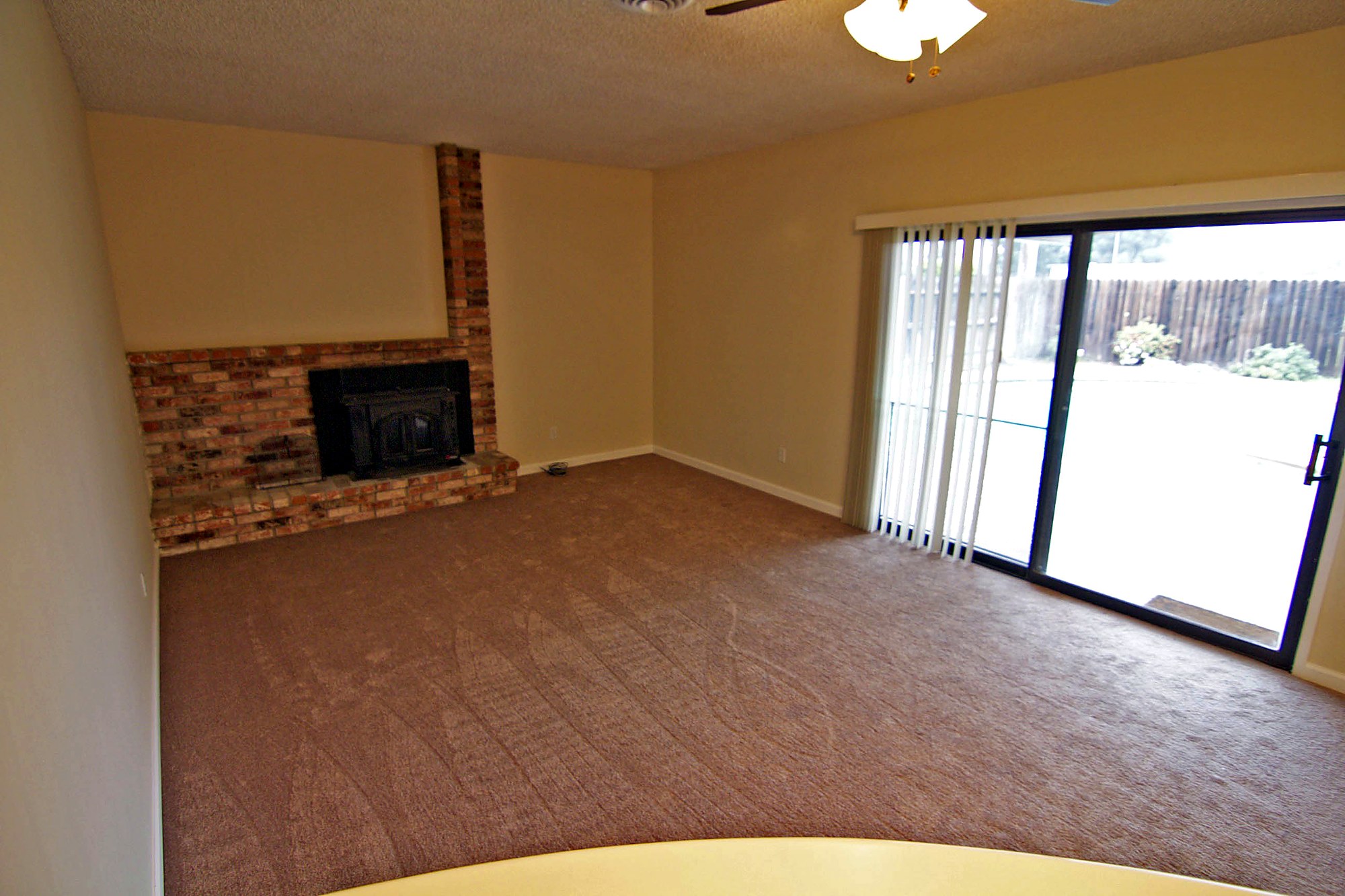 Family room with fireplace at this Notre Dame residence